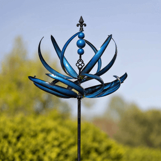 A blue metal windspinner sculpture