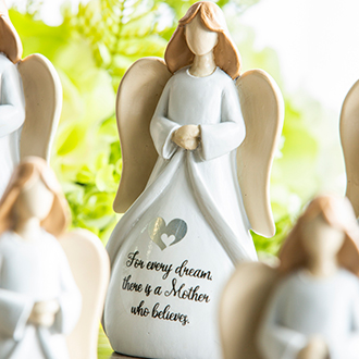 a group of angels figurines